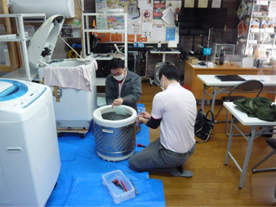 日本エアコンクリーニング協会　第50回縦型洗濯機分解研修会の様子